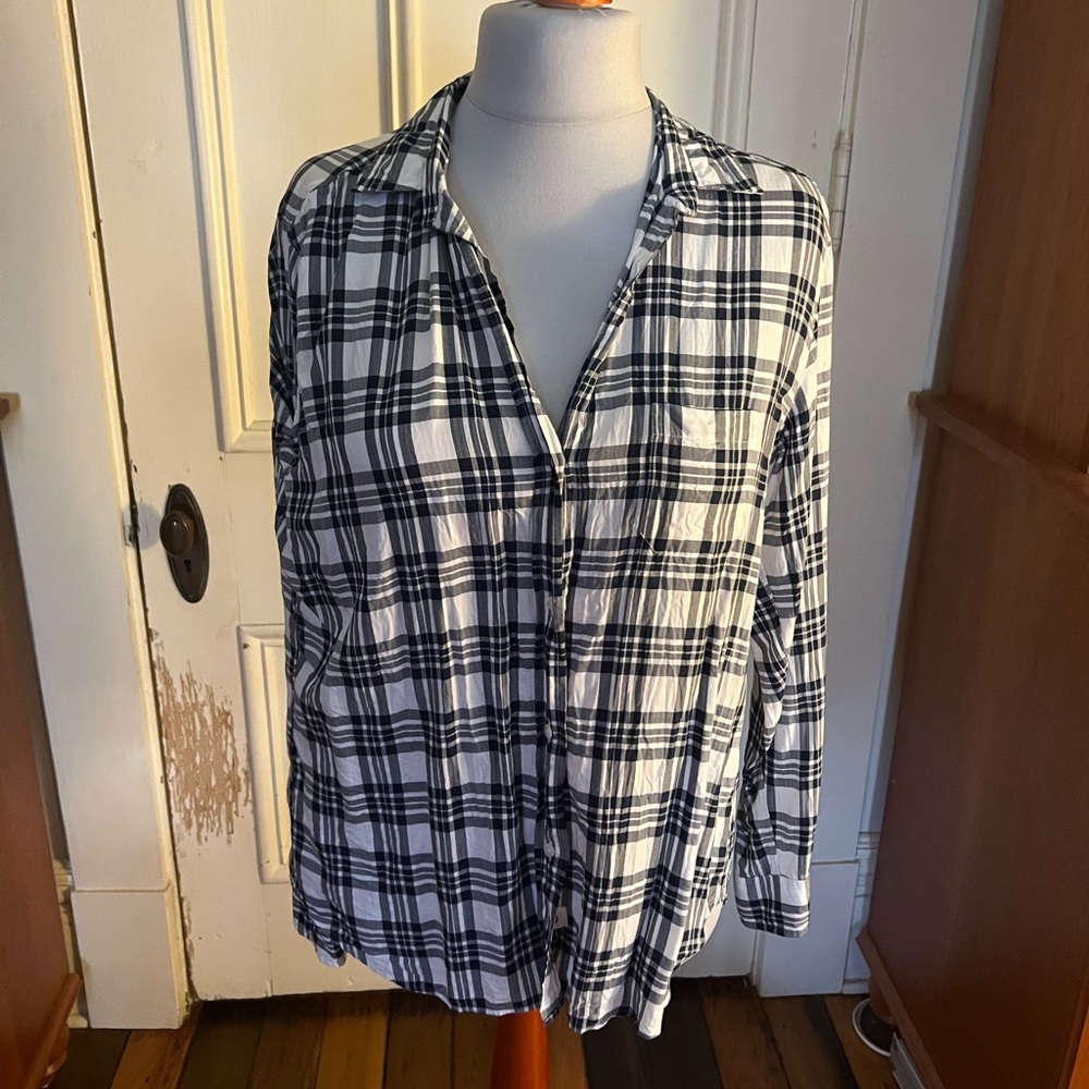 Beautiful light weight button down with v neck. Gently used size Large